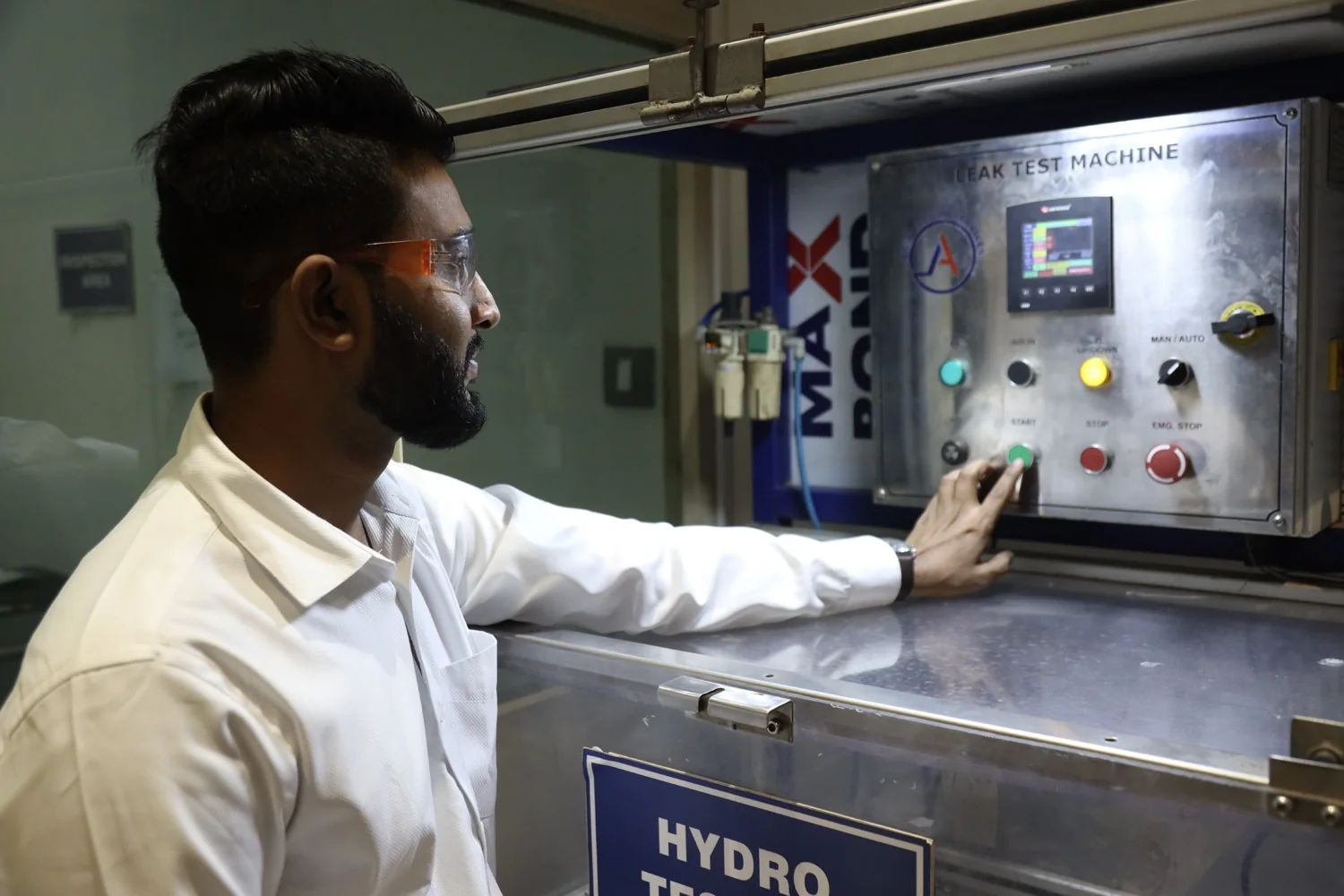 An engineer at the hydrostatic test bench